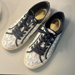 Blue and white Michael Kors running shoes